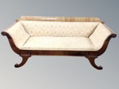 A 19th century Beidermeier mahogany scroll end three seater settee,