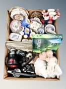 Two boxes containing assorted ceramics, binoculars, place mats, scrabble game, two vintage dolls.