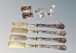 Four continental silver-handled knives, napkin ring stamped 830,