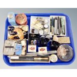 A tray containing sunglasses, costume jewelry, wrist and fob watches, ballpoint pens etc.