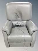 A grey leather electric reclining armchair