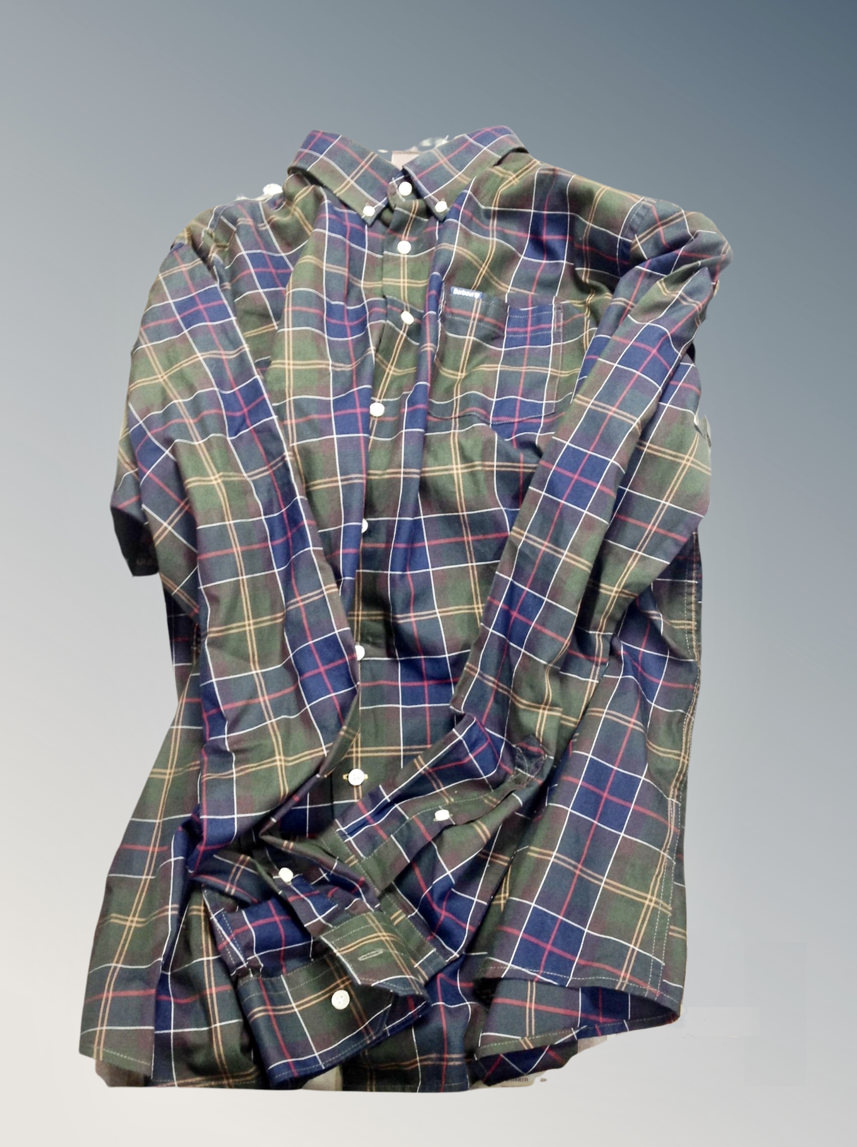 A Barbour shirt size XL on hanger,