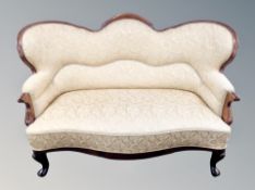 A Continental mahogany two seater salon settee,