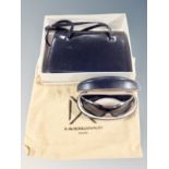A lady's Eros black leather shoulder bag together with a pair of Prada sunglasses in box