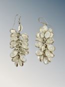 A pair of silver moonstone earrings