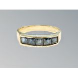 A 14ct gold sapphire half eternity ring, size N CONDITION REPORT: 3.