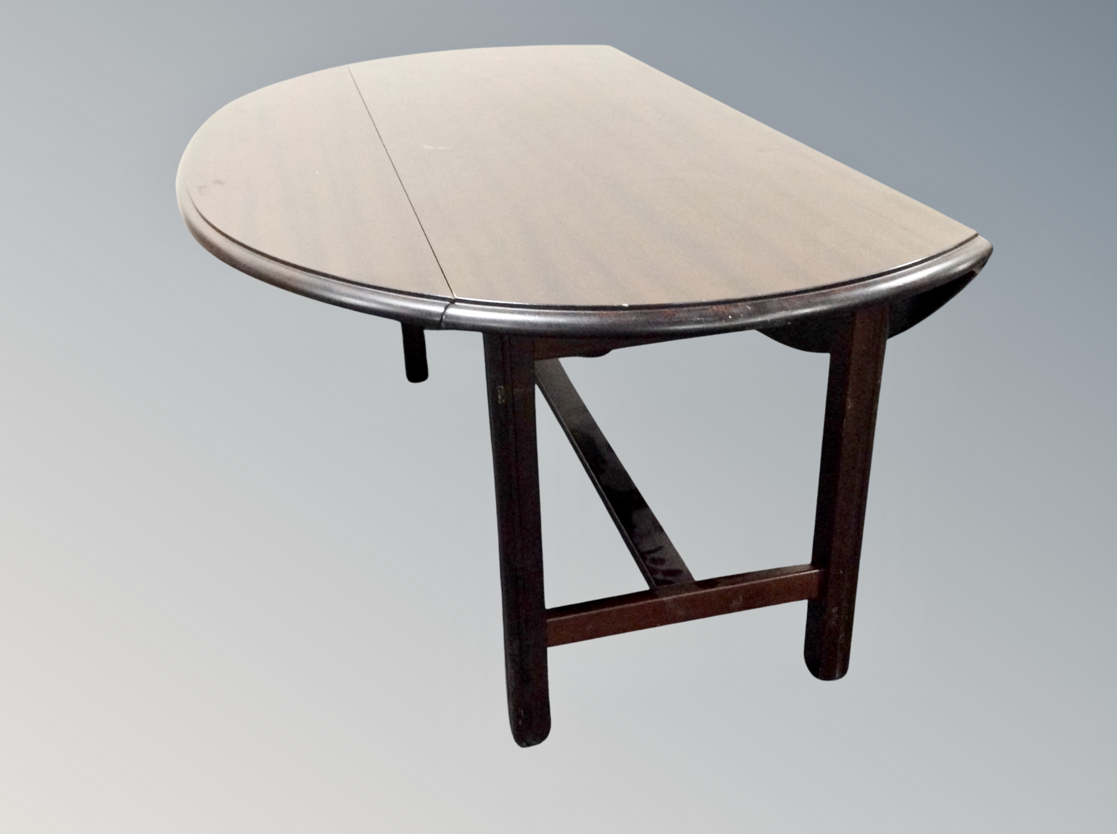 A drop leaf refectory coffee table