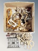 A box of costume jewellery, faux pearls, beaded necklaces,