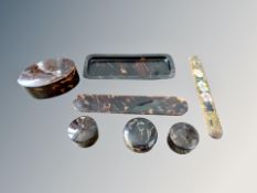 A group of 19th century tortoiseshell items including lidded boxes, tray, letter knife,