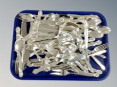 A tray of a large quantity of Danish flatware.
