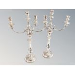 A pair of silver plated three sconce candelabra, height 49 cm.