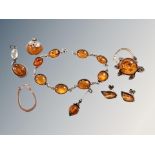 A small collection of silver and amber jewellery