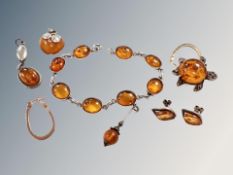 A small collection of silver and amber jewellery