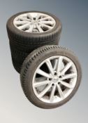 A set of four alloy mega wheels with Michelin Alpin 5 and Rordex snow tyres