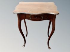 A 19th century shaped occasional table fitted a drawer on cabriole legs