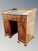 A Continental mahogany clerk's desk,