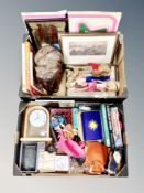 Two boxes containing Barbie figures and other toys, carved wooden elephant,