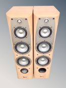 A pair of Infinity floor standing speakers (no cables).