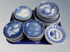 A tray of Bing and Grondahl blue and white porcelain commemorative plates.