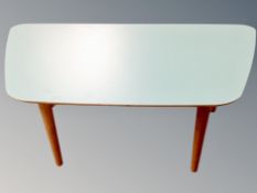 A Scandinavian melamine topped low table