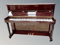 A Kohler & Campbell model KC-145 overstrung upright piano in high gloss mahogany case, width 148 cm,