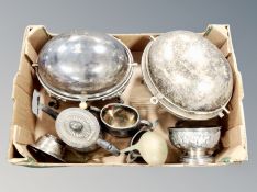 A box of silver plated wares including pair of breakfast warmers with roll top lids, tea service,