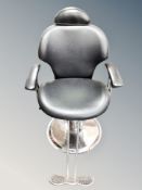 A hydraulic barber's chair