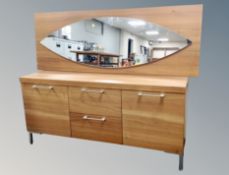 A contemporary double door sideboard fitted two central drawers on raised metal legs with mirror
