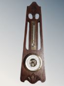 A Danish oak barometer / thermometer.