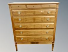 A Scandinavian mahogany eight drawer chest,