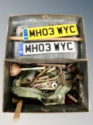 A tin trunk containing assorted hand tools, cobbler's last,