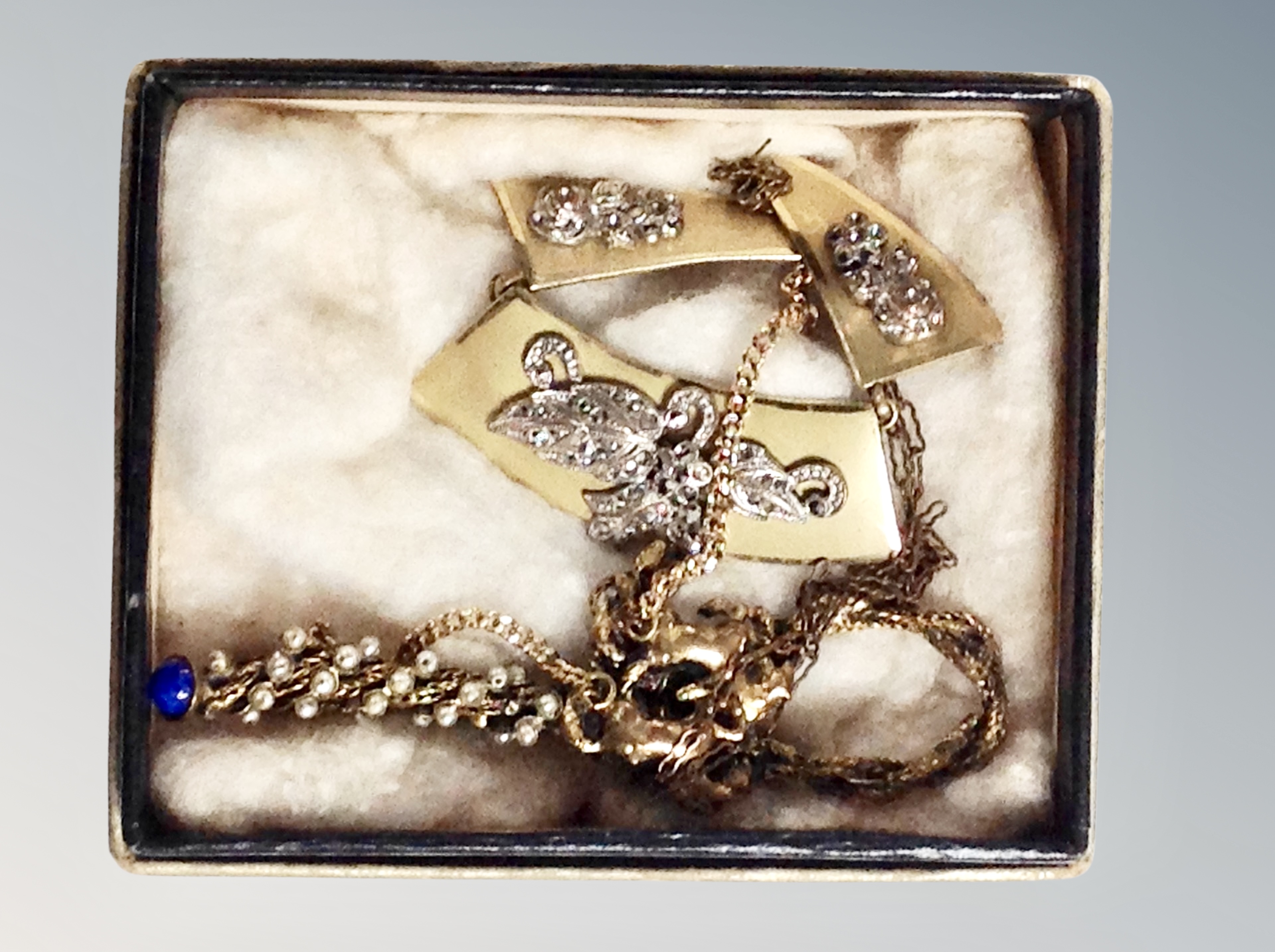 A vintage Marcasite collar necklace and faux pearl brooch decorated with horses