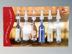 An Ensemble eight-bottle optic stand,