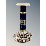 A CBL Ltd Imari porcelain candlestick,
