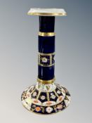 A CBL Ltd Imari porcelain candlestick,