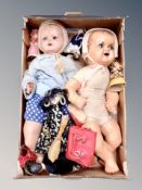A box of mid century dolls with accessories