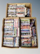 Three boxes of approximately 150 DVD's