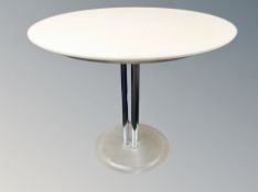 A circular melamine topped kitchen table diameter 90 cm