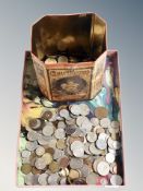 A tray and tin containing assorted British and Foreign coins