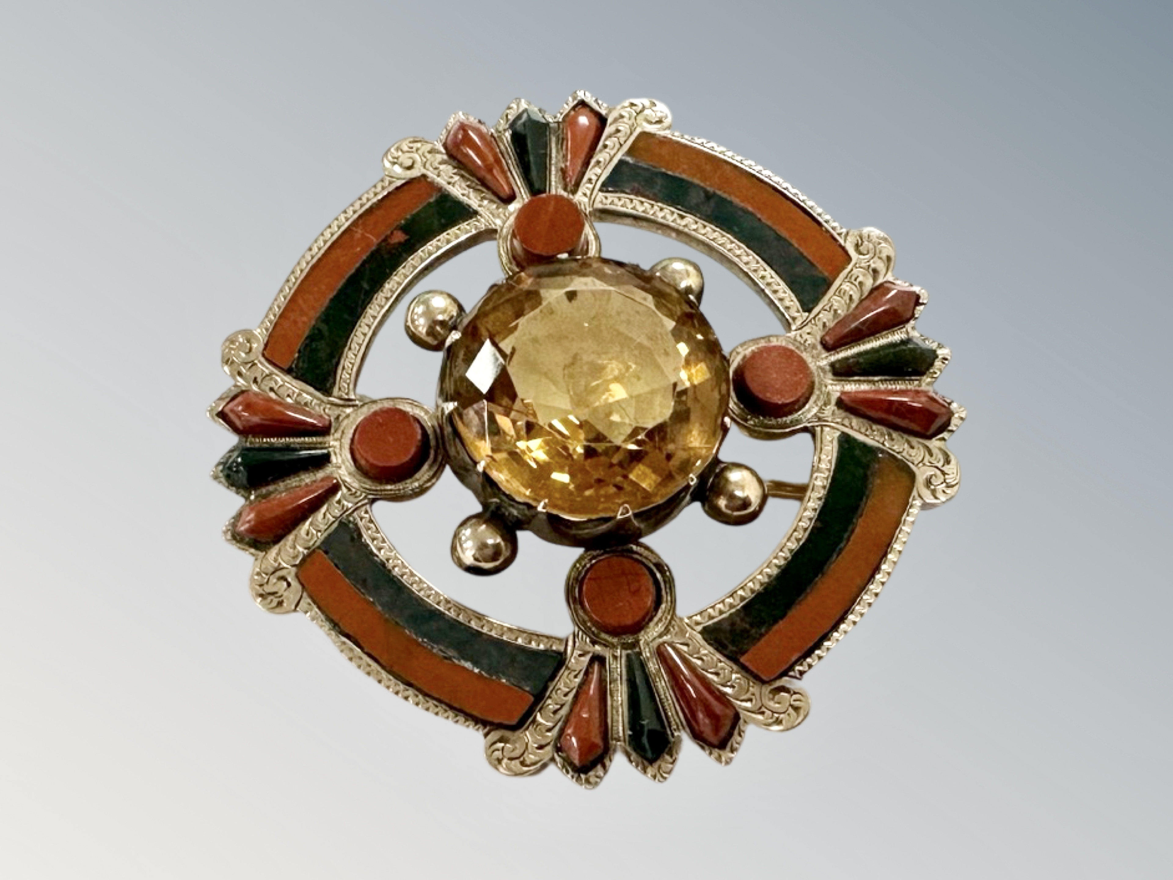 A Victorian rose gold citrine, bloodstone and carnelian Celtic brooch,