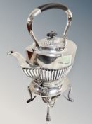 A good quality silver-plated spirit kettle on stand with burner,