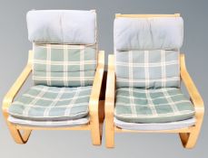 A pair of Scandinavian beech framed armchairs