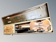A 19th century violin and bow in fitted wooden box (for restoration).