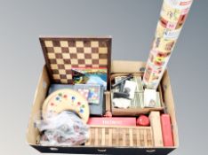 A box containing rock samples, chess board and other games, Meccano etc.