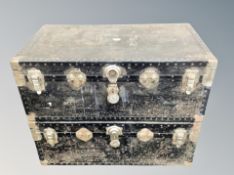 Two vintage metal bound shipping trunks