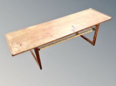 A 20th century teak low rectangular coffee table,