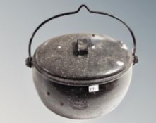 A large cast iron enameled swing handled pot, overall height 38 cm.