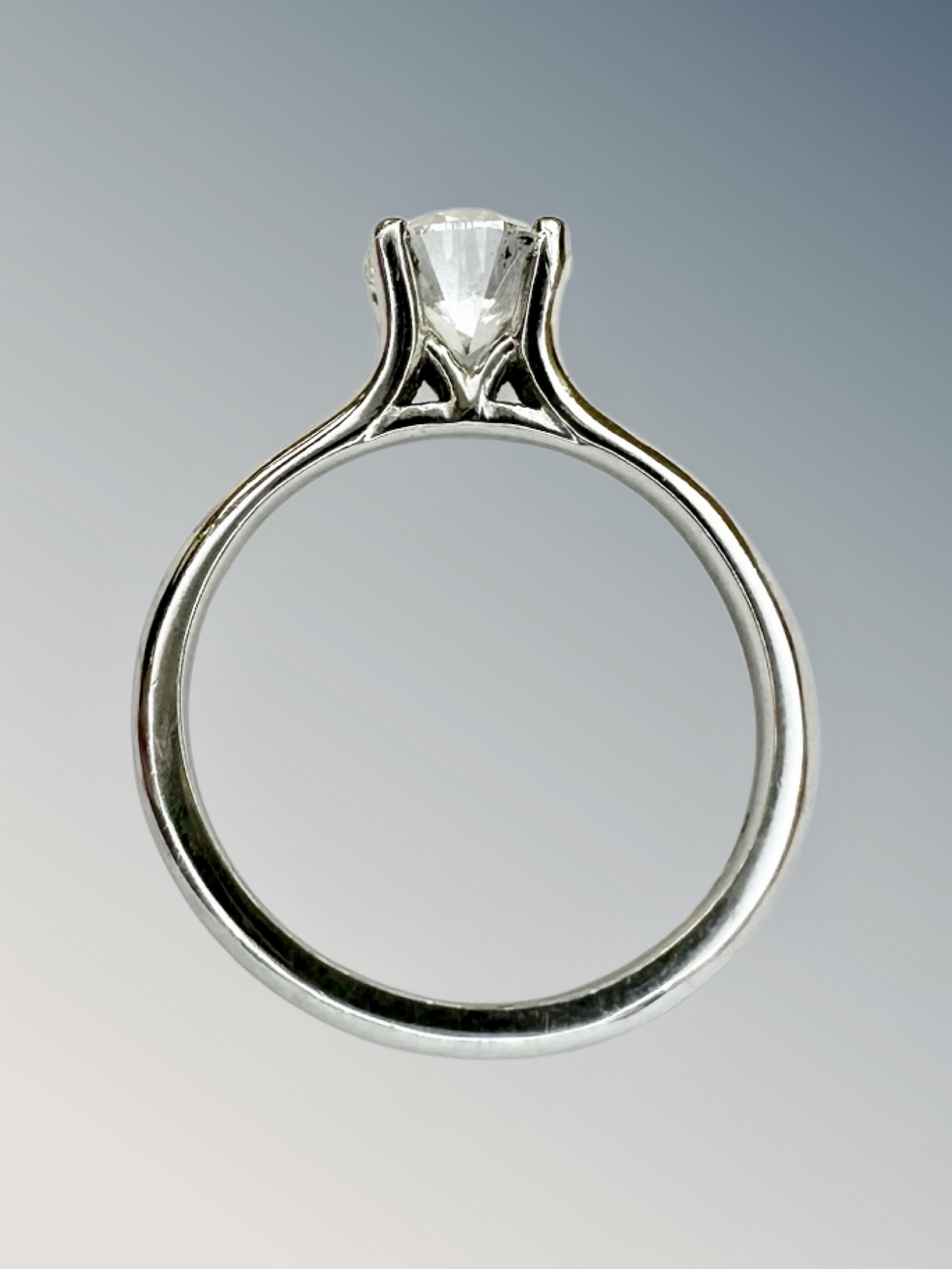 A platinum diamond solitaire ring, the brilliant-cut stone weighing 1. - Image 3 of 3