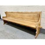 A pine long bench, length 252 cm.