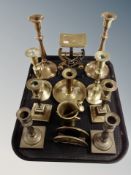 A tray of brass ware including several pairs of candlesticks, pestle and mortar chamber stick,